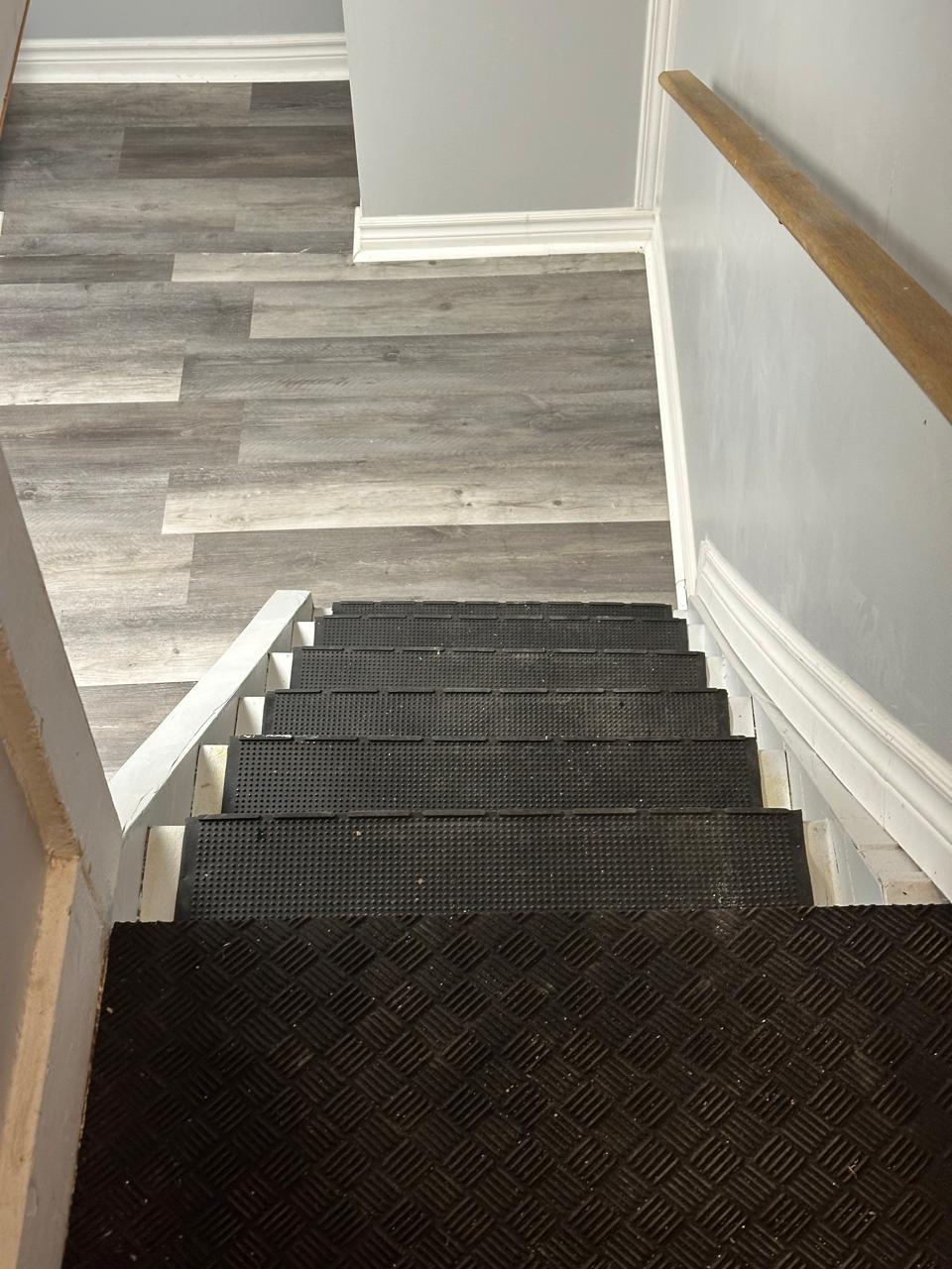 New stair treads and luxury vinyl flooring